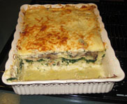 small spinach lasagna in a pan